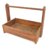 A wooden trug, 40cm high, 50cm wide.