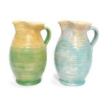 Two Beswick pottery jugs, of cylindrical banded form, in mottled blue and green colour way, printed