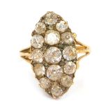 A diamond marquise dress ring, the marquise shaped panel set with off cut diamonds, of varying size,