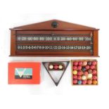 A Victorian mahogany wall mounted snooker scoreboard, 46cm high, 106cm wide, together with vintage s