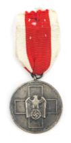 A German Third Reich Social Welfare medal, with ribbon.