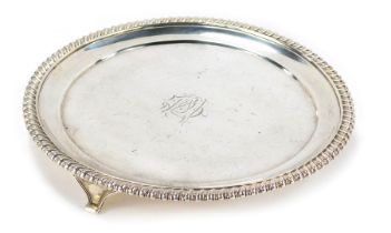 A Victorian silver card tray, with a fluted border and bearing the initials CM, retailer Thomas, Lon