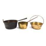 A collection of copper and brass ware, to include a brass helmet shaped coal scuttle, copper kettle,