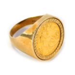 A George V half gold sovereign, dated 1918, in a 9ct gold ring mount, London 1986, size R, 8.8g.