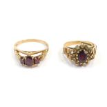 Two 9ct gold garnet dress rings, comprising a three stone ring, size T½, and a cluster set with CZ s