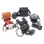 An Olympus AZ-300 Super Zoom camera, a Super Zoom 2800 DLX camera, Kodak ColorSnap 35 camera, Corone