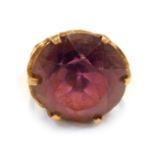 A 9ct gold dress ring, set with purple paste stone, in a chunky raised basket setting, ring size O,