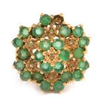 A 9ct gold cluster ring, the cluster each set with miniature clusters of emeralds and cz stones, in