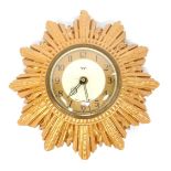 A Smiths Sectric sunburst wall clock, with circular Arabic numeral dial, quartz movement, 20cm diame