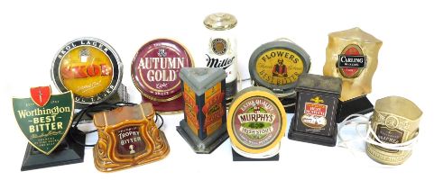 A collection of beer pump labels, to include Heineken, Taunton Autumn Gold Cider, Skol, Whitbread, S