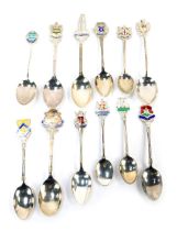 Twelve silver and enamel commemorative tea or coffee spoons, shield and landmark terminals to includ