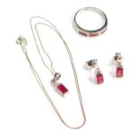 An 9ct white gold ruby and diamond jewellery set, comprising ring, necklace and earrings, the ring s