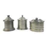 Three 19thC pewter tobacco jars, two of cylindrical form, the other of compressed cylindrical form,