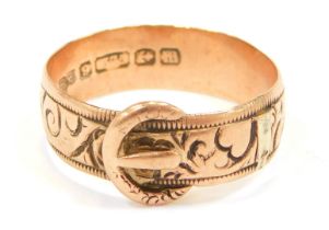 A Victorian 9ct gold buckle ring, with scroll hand design, with matched band, size U, 3.9g.