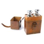 A Drew and Sons of Piccadilly cased travel bottle set, with two rectangular cut glass travel bottles
