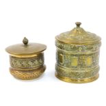 Two late 19thC/early 20thC brass tobacco jars, both of cylindrical form, one impressed with floral m