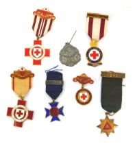 A group of Red Cross enamelled medals, named to M Turner 4482, Hilda Wollen 6851, HM Simmons 25718 a