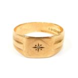 A 9ct gold signet ring, with rectangular panel, set with tiny diamond, with etched shoulders, size S