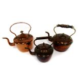 Three Victorian teapots, the largest 30cm high.