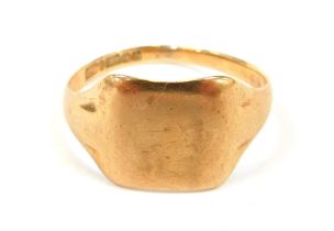 A 9ct gold signet ring, of plain design, size T, 2.5g all in.