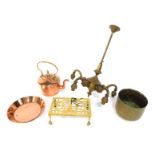 A collection of copper and brass wares, to include brass trivet, copper and brass kettle, brass ligh