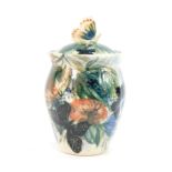 A Welsh Studio pottery condiment jar and cover, of baluster form, the lid with butterfly handle, the