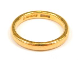 A 22ct gold wedding band, of plain design, size L, 4.68g.