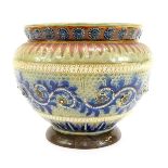 A Doulton Lambeth stoneware jardiniere, with etched and relief moulded decoration, flowers, beaded s