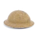 A WW1 British Brodie tin helmet.