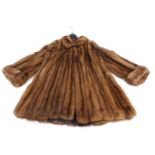 A mink three quarter length coat, underarm measurement 40cm.