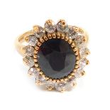 A 9ct gold cluster ring, set with paste stones, ring size M½, 4.9g all in.