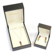 An 18ct white gold rainbow pendant and earring set, the pendant set with citrine, peridot, aquamarin