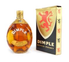 A bottle of Dimple Scotch Whisky, boxed.