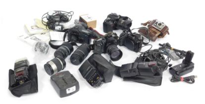 A group of cameras, including a Nikon D200 camera, Finetta camera, two Canon EOS D30 cameras, togeth