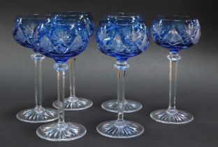 A set of set Bohemian blue cut glass hock glasses, 19cm high.