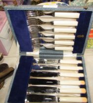 A cased set of fish knives and forks.