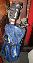 A Cleveland Golf bag, containing a set of golf clubs.