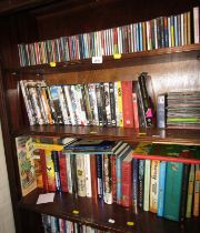 Various DVDs, CDs, children's books, etc., to include Artemis Fowl, Ink Heart, Jacqueline Wilson, DV