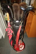 A Dunlop golf bag containing a set of golf clubs, to include Pin Seeker Pro Tour Series 1, Big Berth