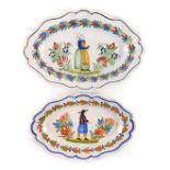 A near pair of mid 19thC Adolphe Porquier Faience plates, depicting male and female figures within l