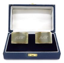 A pair of 9ct gold napkin rings, engraved, cased, 88g.