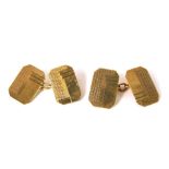 A pair of 9ct gold cufflinks, each of engine turned and cross hatched decoration, with chain link, 3