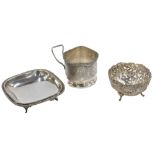 A silver plated rectangular pin dish, on tripod base with reeded border, a Continental white metal p