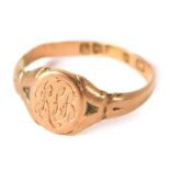 A 9ct gold signet ring, with oval shield bearing the initials RLB, with V splayed shoulders, ring si