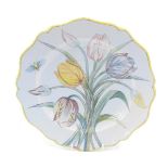 A 19thC Porquier Beau Faience botanical plate, decorated with insect, 25cm diameter. (AF)