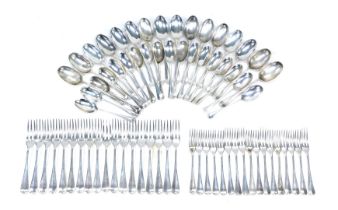 A composite Edwardian silver part canteen of cutlery, comprising a set of twelve rat-tail dessert sp