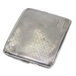 An Edward VII silver cigarette case, with engine turned decoration, bearing the initials GCRT, with