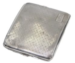 An Edward VII silver cigarette case, with engine turned decoration, bearing the initials GCRT, with