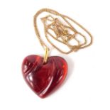 A Baccarat glass red heart pendant and chain, the pendant 4cm high, on a 9ct gold fine link neck cha