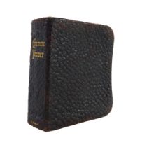 A miniature common prayer book, published by Eyre and Spottiswoode, with handwritten note dated Janu